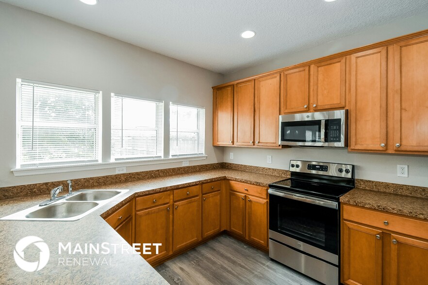 Building Photo - 9370 Jayhawk Ln