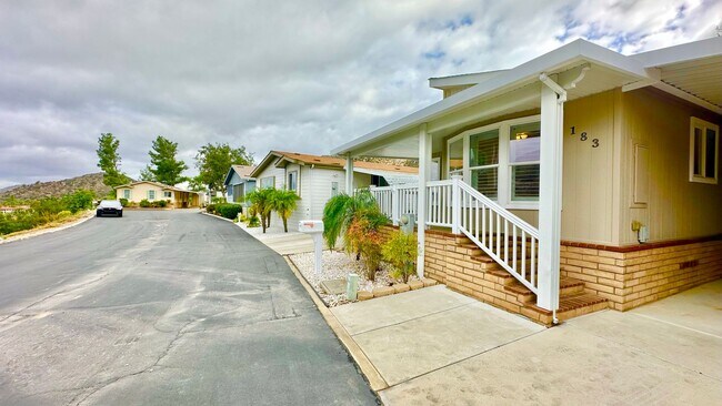 Building Photo - Light, Bright, and Freshly Updated Home in the Gated & Desirable Champagne Village 55+ Community!