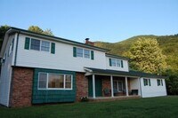 Building Photo - Large Partially Furnished 4/2.5 in Beautif...