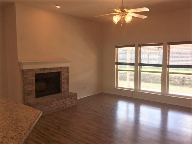 Living Area with Fireplace - 302 Howard Way Dr