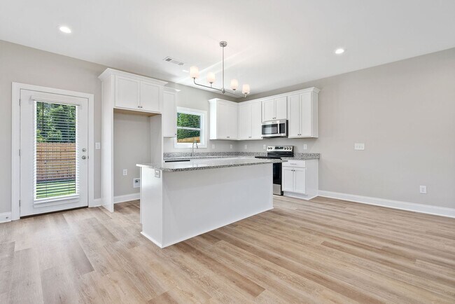 Building Photo - New Townhome in Hartbrook!