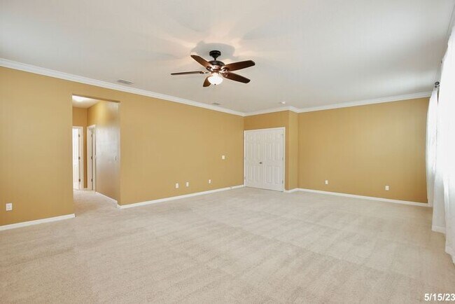 Building Photo - Gorgeous 4/3.5 Home with a Large Fenced Ba...