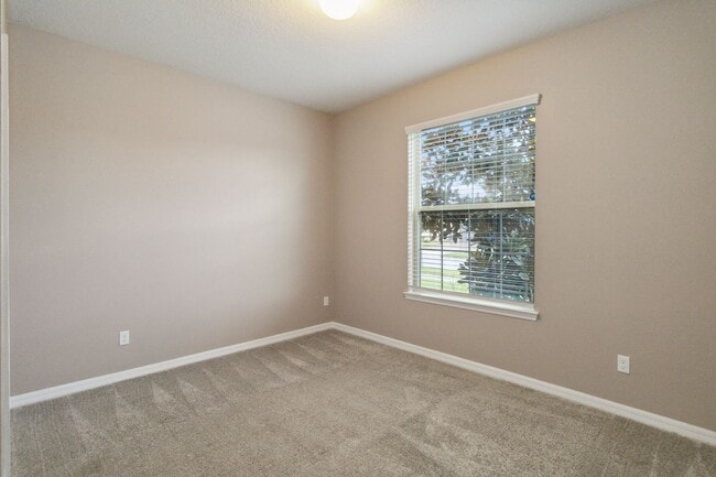 Building Photo - Gorgeous Energy Efficient 4/2 Home in Gated Community Close to Lake Nona