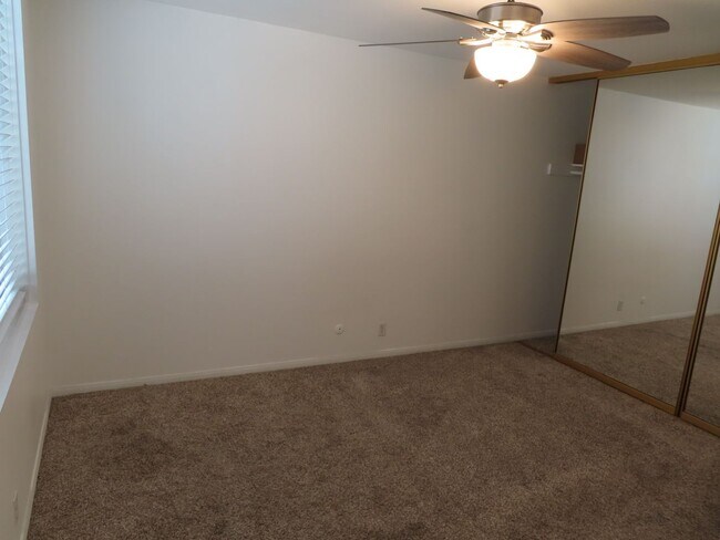 Building Photo - Partially Furnished Two Bedroom Condo in College Area