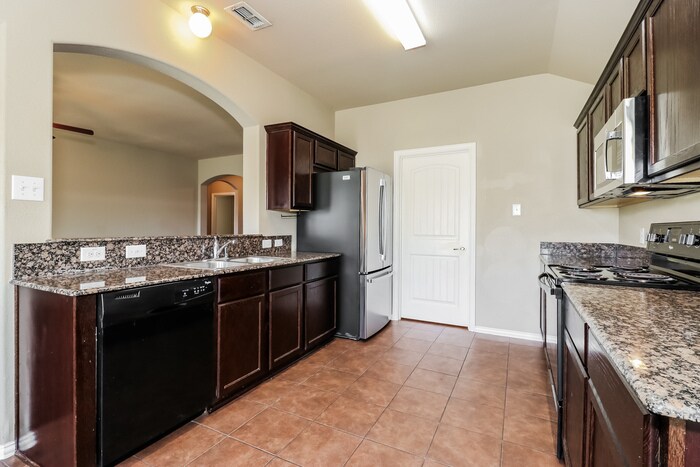 Building Photo - 7978 Los Alamitos Ln