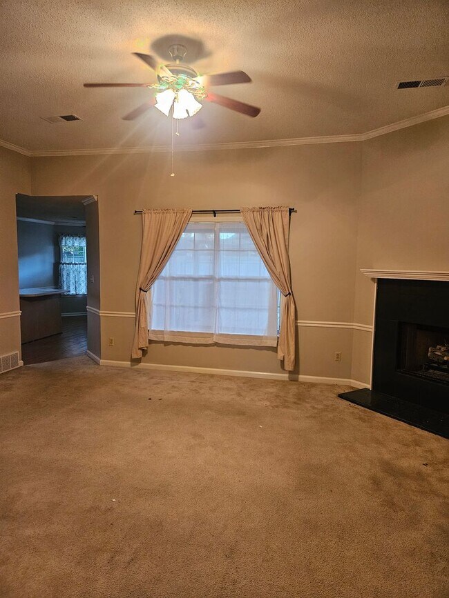 Building Photo - Available Now!   half off first months ren...