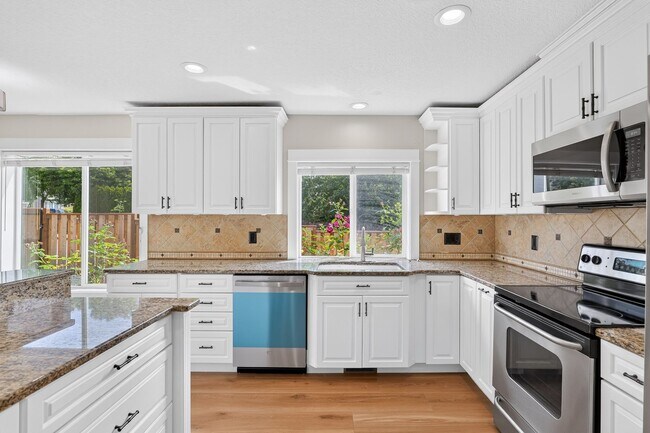 Building Photo - Beautifully Refreshed Clackamas Home with Bright Interiors & Private Backyard Retreat