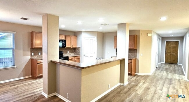 Building Photo - 6046 Mule Deer Dr