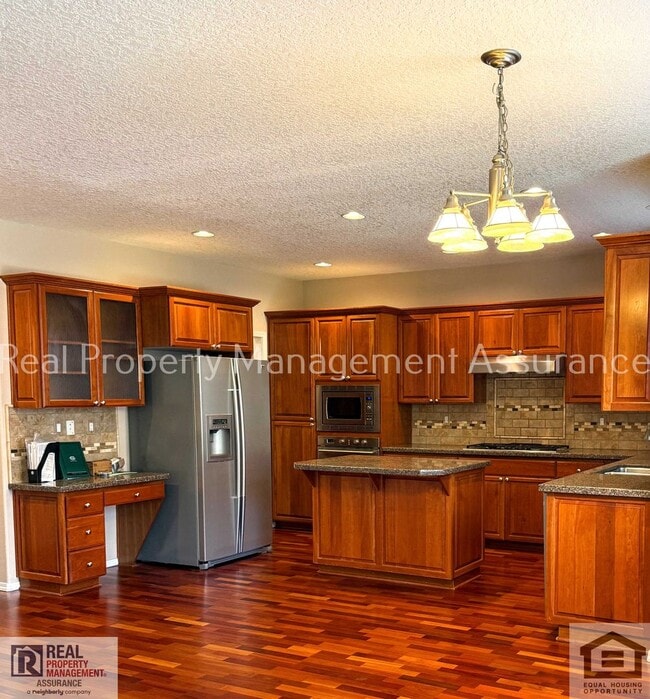 Building Photo - 13611 NW Stonebridge Dr