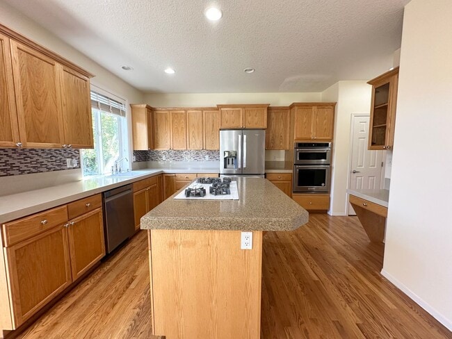 Building Photo - 4 Bedroom Bethany Home with Office on Main Level!