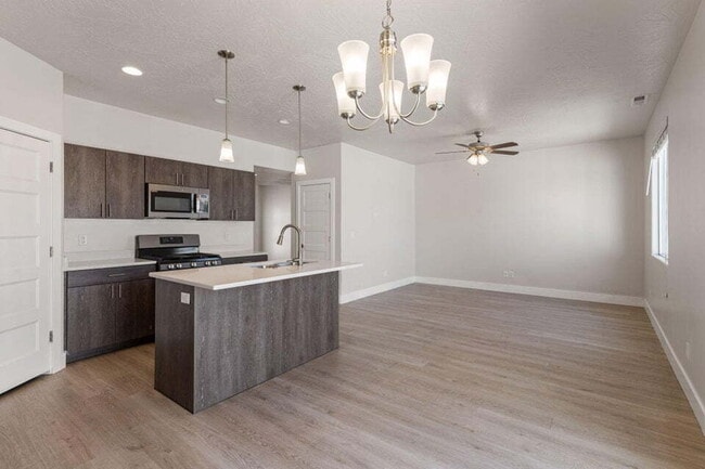 Building Photo - "Spacious 3-Bedroom Townhouse Retreat with...