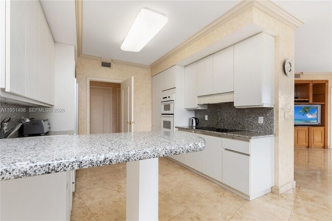 Building Photo - 9601 Collins Ave