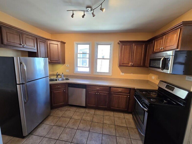 Kitchen will have new light paint - 6621 N Campbell Ave