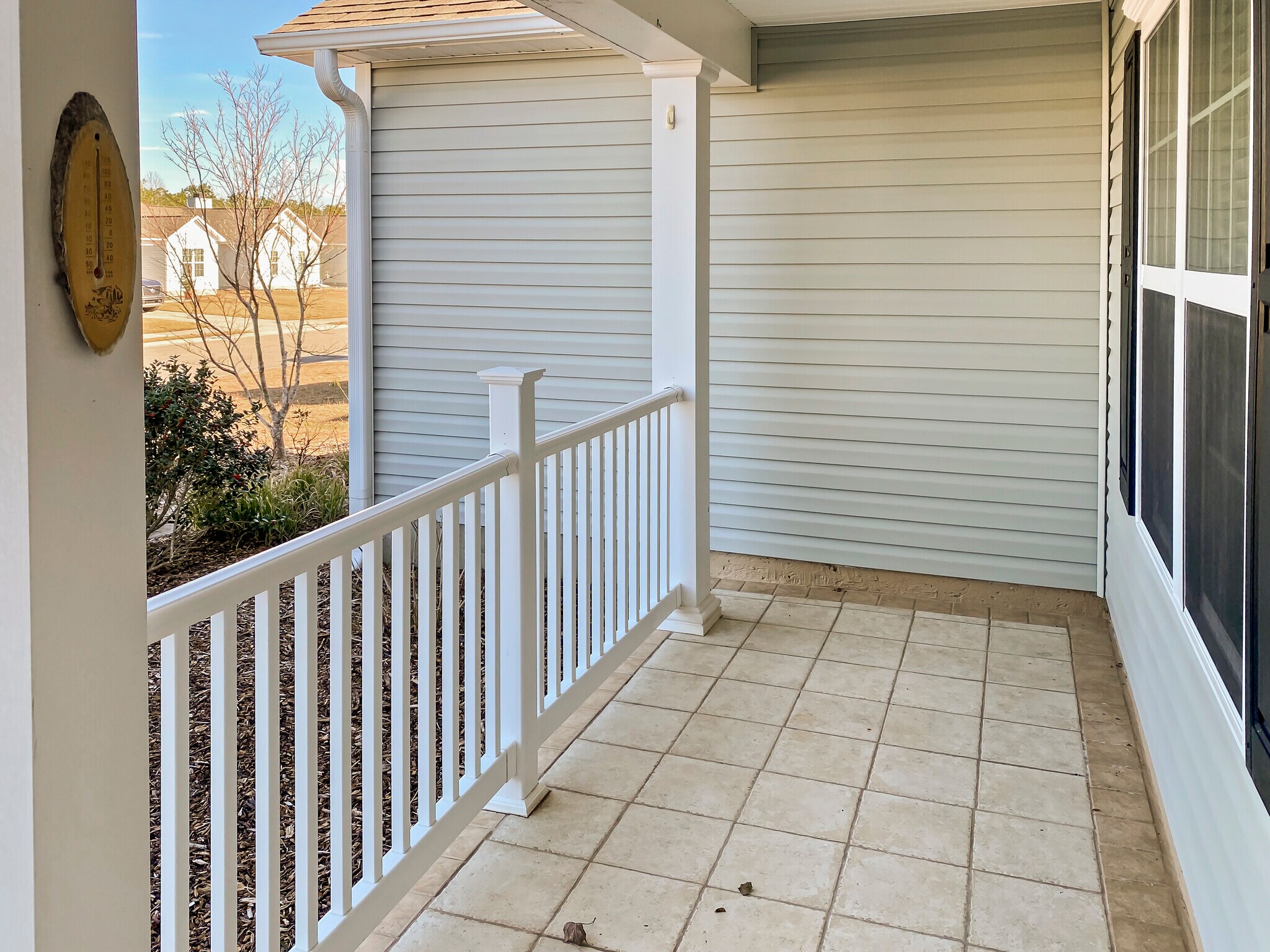 Tiled Porch - 213 Red Carnation Dr