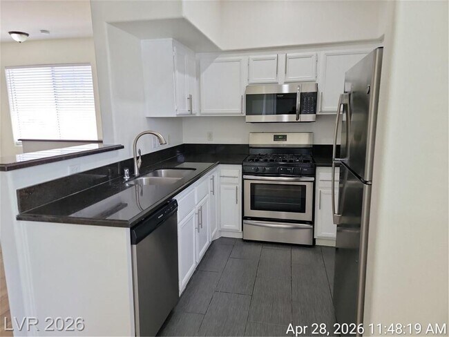 Building Photo - Gated Falls Condo with 3 Bedrooms, Granite Kitchen & Resort Amenities