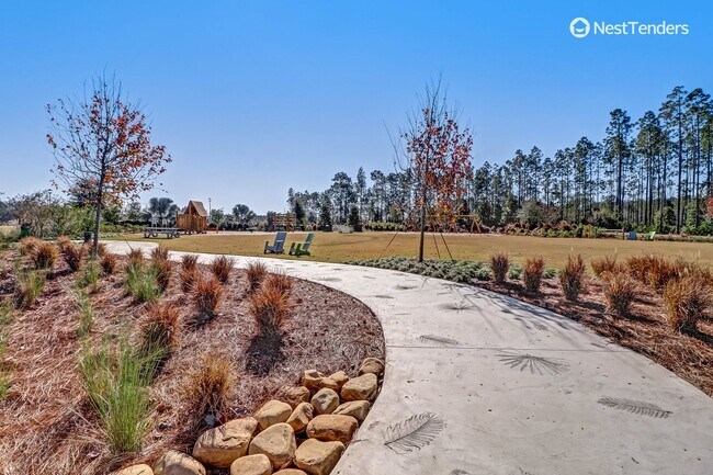 Building Photo - Wildlight Stunner Near Pool & School!