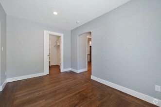 Building Photo - Renovated Duplex unit in the heart of Elmh...