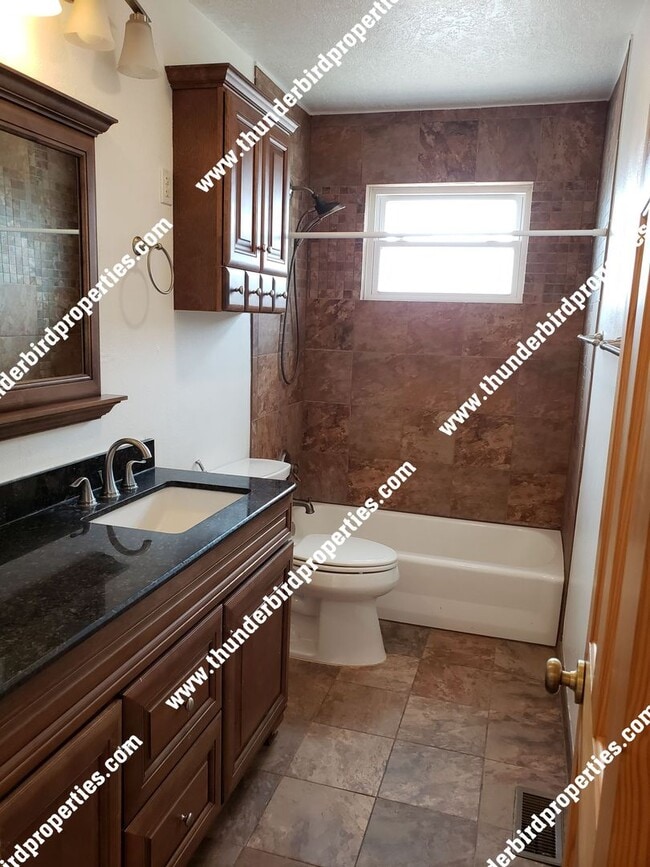 Building Photo - Nice 3 Bedroom, 2 Bathroom, 2 Car Garage and 1,360 Sq Ft. Brick Home in NE Heights.