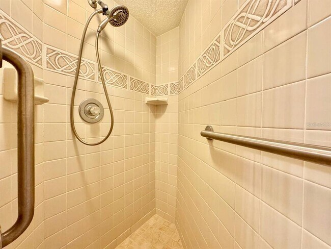 Building Photo - 5950 Pelican Bay Plaza S