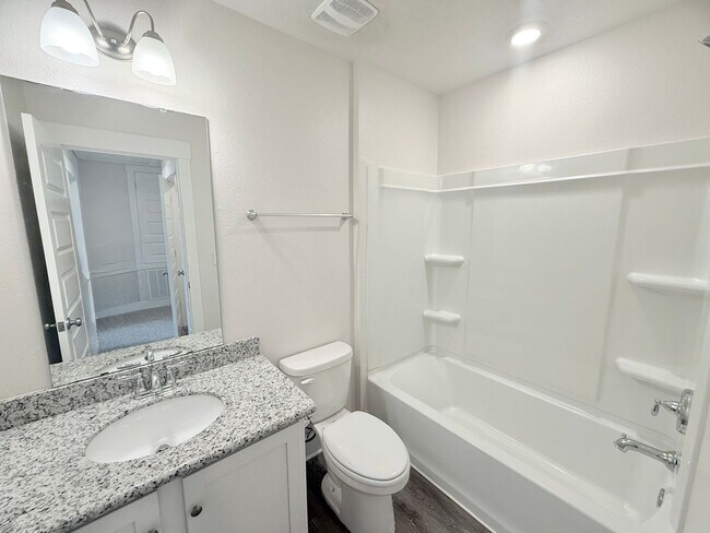 Building Photo - Stunning Townhome - End Unit