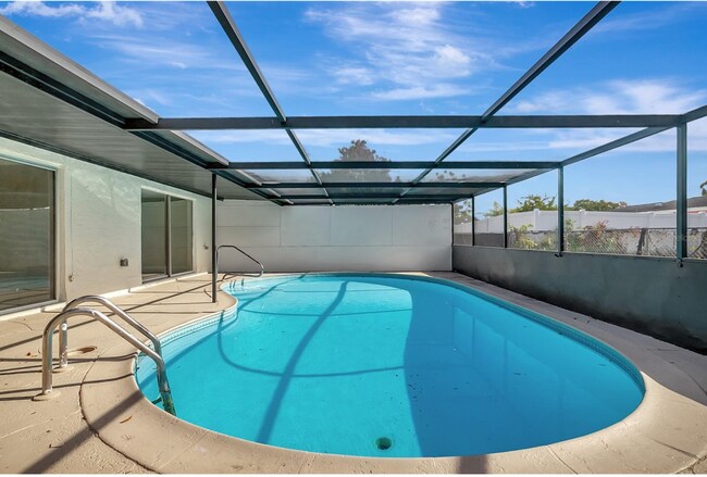 Building Photo - 7210 Parrot Dr