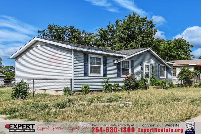 Building Photo - A cozy 3-bedroom, 2-bathroom home nestled ...