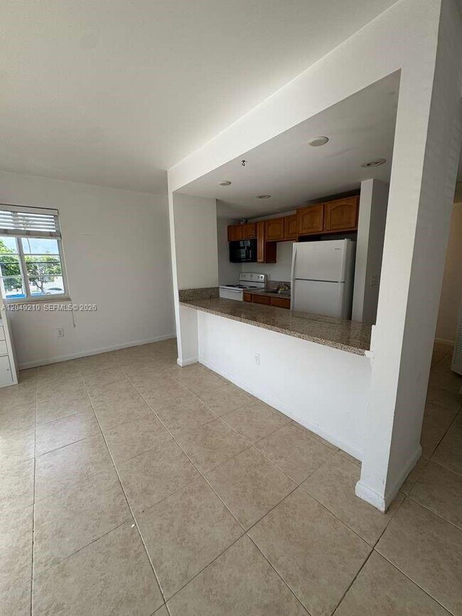 Building Photo - 7130 Rue Versailles Dr