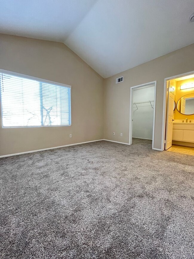 Building Photo - PICTURE PERFECT!  3 BR/3 BA END UNIT CONDO with DIRECT ACCESS 2 CAR GARAGE