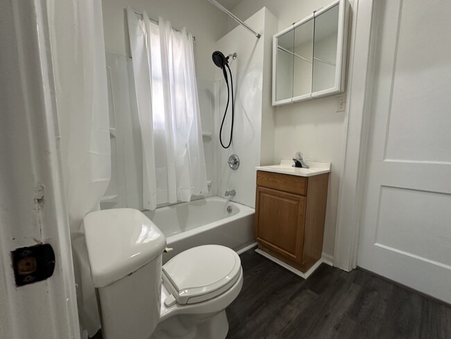 Bathroom with shower and new flooring - 5371 N 27th Ave