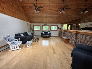 Building Photo - Charming 3BR Waterfront Retreat with Sunroom, Brick Accent & Scenic Lake Views