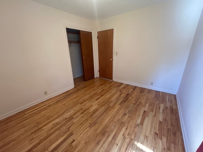 Building Photo - Spacious 2 Bedroom 1 Bath Duplex in Park-Like Setting - Pets Welcome
