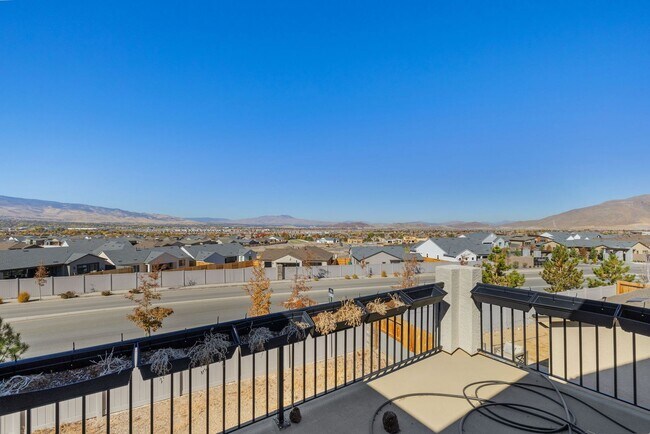 Building Photo - Beautiful 4BR/4BA home in the gated Copper View community. Features spacious living areas, mounta...