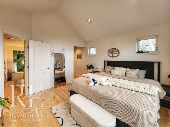 Building Photo - Light-Filled View Home with Vaulted Ceilings & Warm Wood Finishes