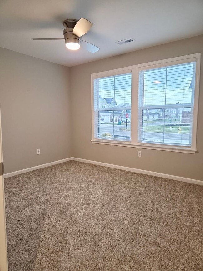 Building Photo - Exquisite brand new condo w/everything! Ground floor, no stairs, attached garage