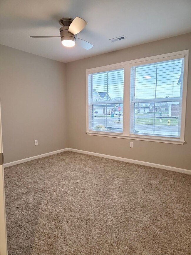 Building Photo - Exquisite just built condo with everything! Ground floor, no stairs, attached garage