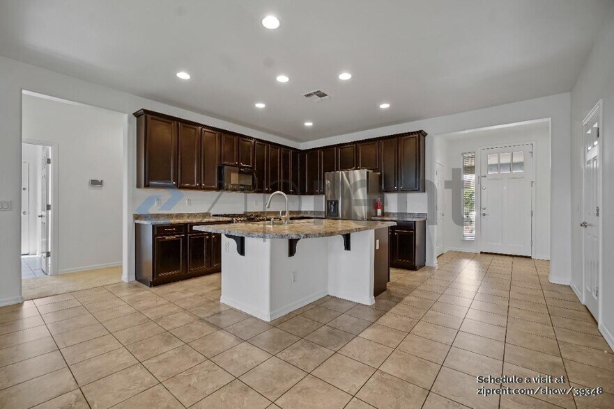 Building Photo - 8779 N 89th Dr