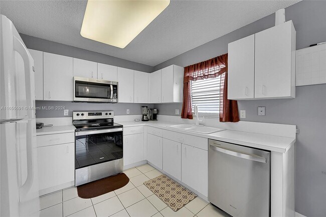Building Photo - 3884 NW 63rd Terrace