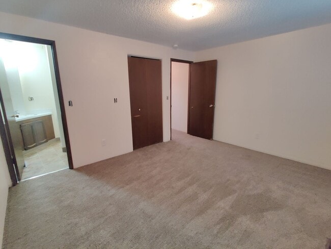 Building Photo - Duplex with garage and fenced yard and upd...