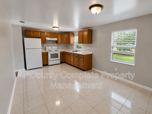 Building Photo - 10881 Key Coral Dr
