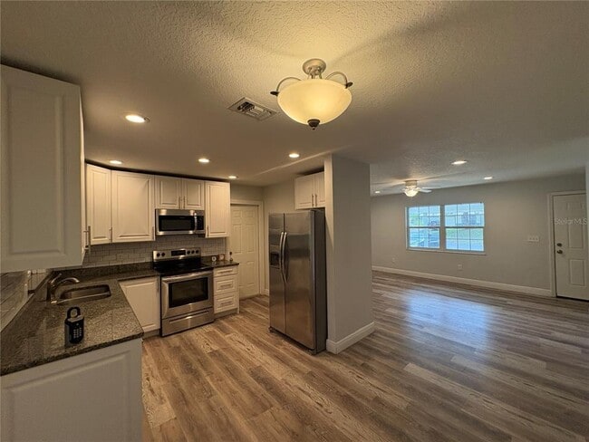 Building Photo - 5825 Lullaby Ln
