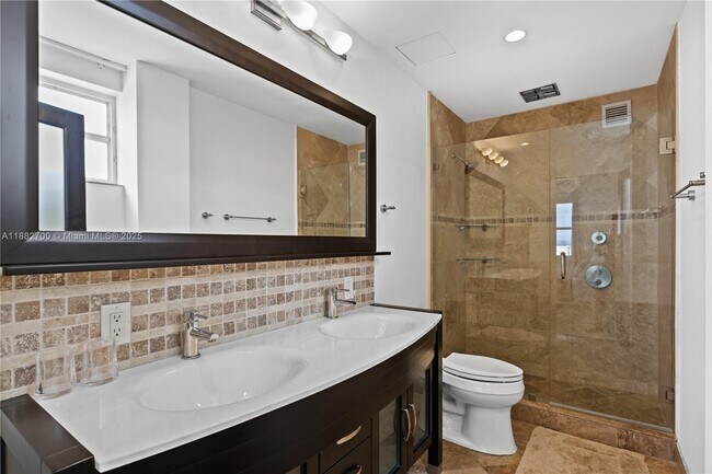 Building Photo - 9100 W Bay Harbor Dr