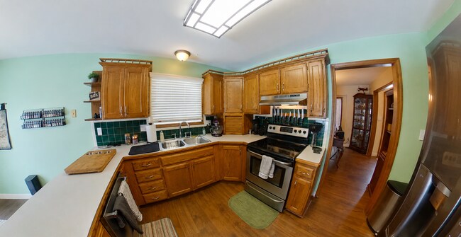 Building Photo - 3D Tour Available - West Side Manhattan Home + 2-Car Garage  + Washer & Dryer! Available August 1...