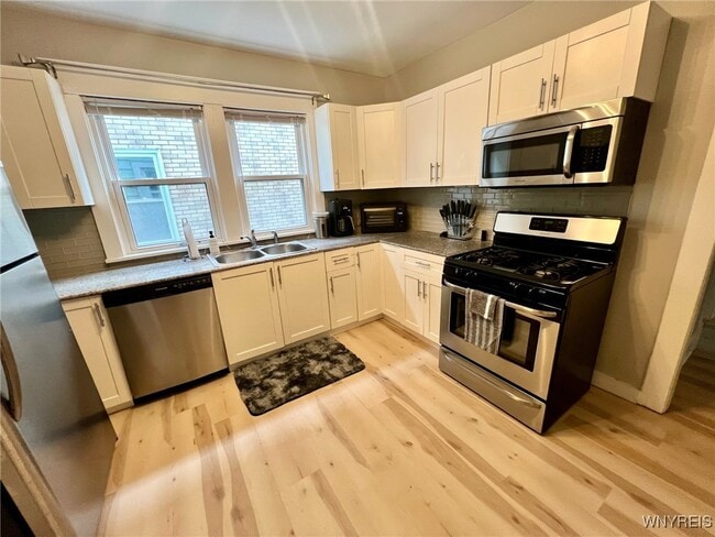 Building Photo - 1691 Hertel Ave