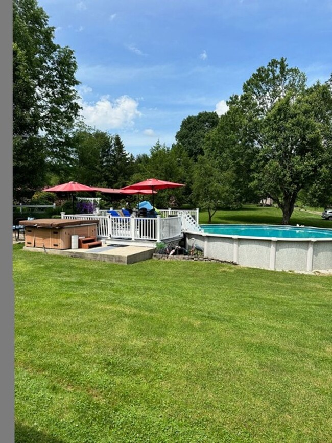 Building Photo - 5 Bedroom 2 1/2 Bath Home w/ Wrap Around P...