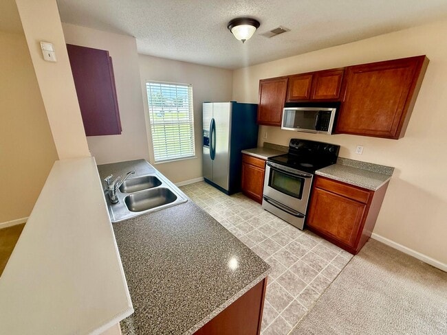 Building Photo - Now Available in Hunter's Crossing!