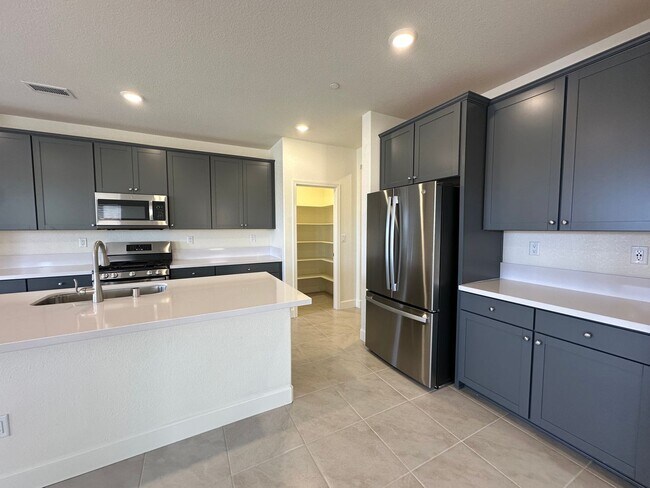 Building Photo - Gorgeous 5 Ridges Home with Spectacular Mountain Views!