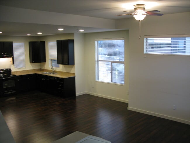 Building Photo - Modern End Unit 3 Bedroom Townhome with Solar.
