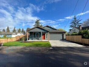 Building Photo - Charming 4-Bedroom Home with 2 Full Baths ...