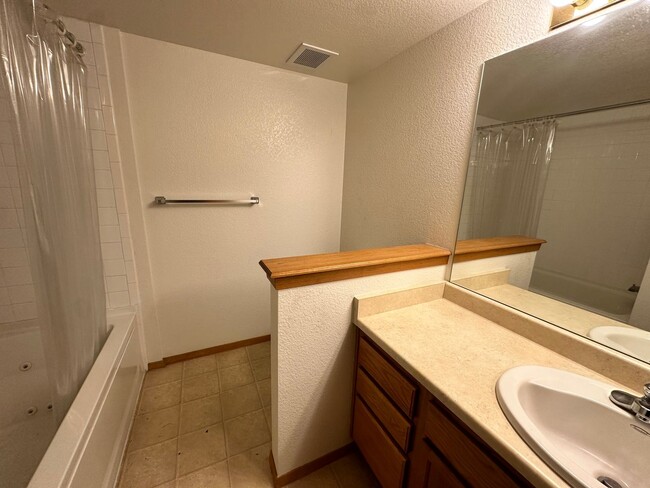 Building Photo - Stylish 3rd Level, Private 2 bedroom Apartment With LVP Flooring, Decks, Gas Fireplace & In-Unit ...