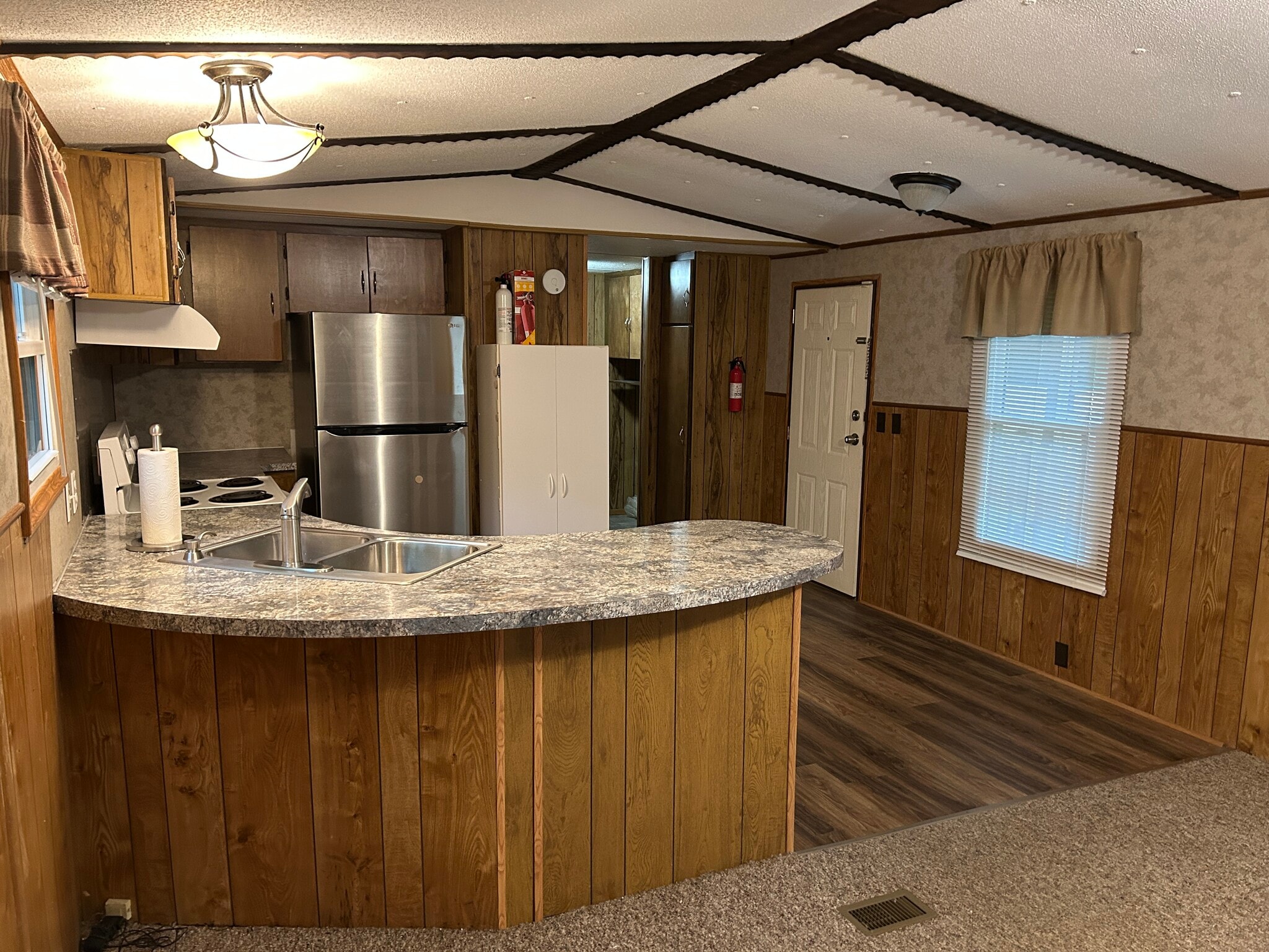 Kitchen with back door - 10975 E US Highway 64